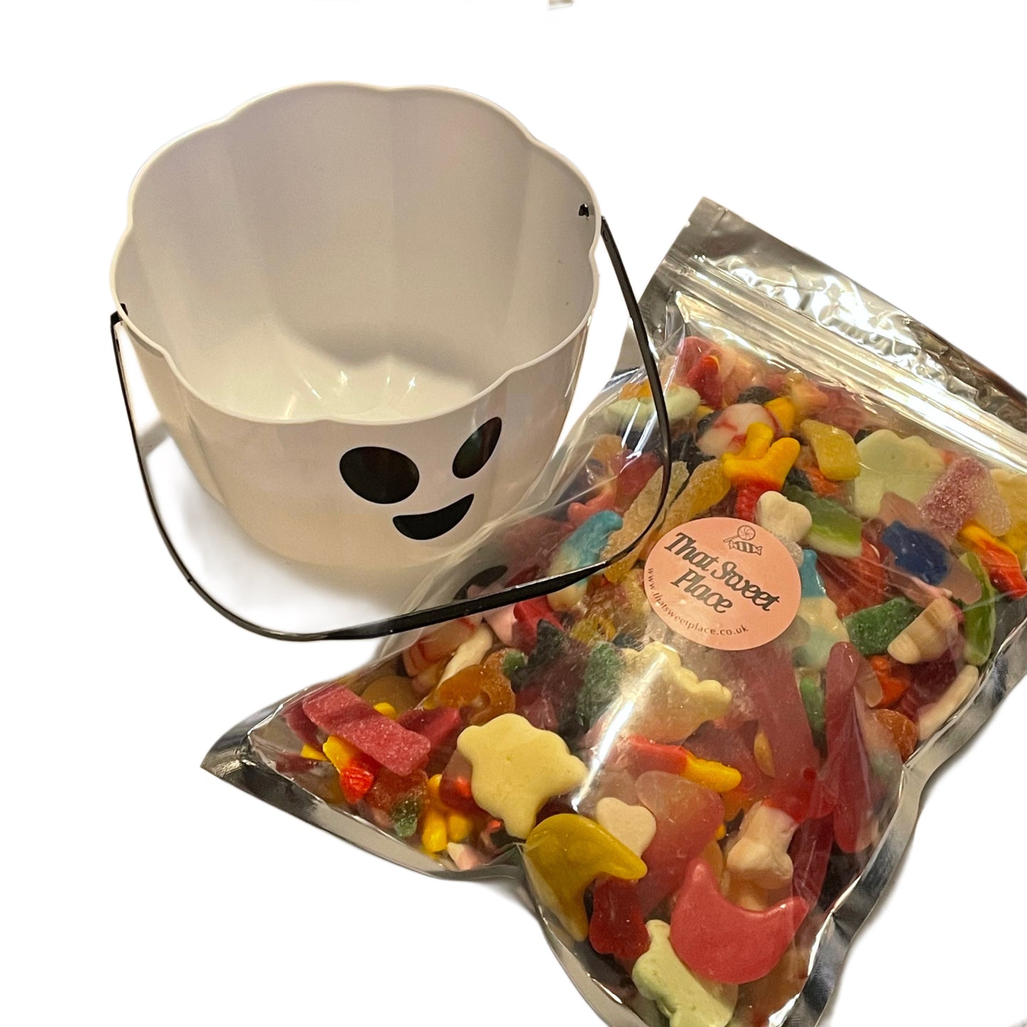 Halloween-themed candy bag with ghost bucket on a white background