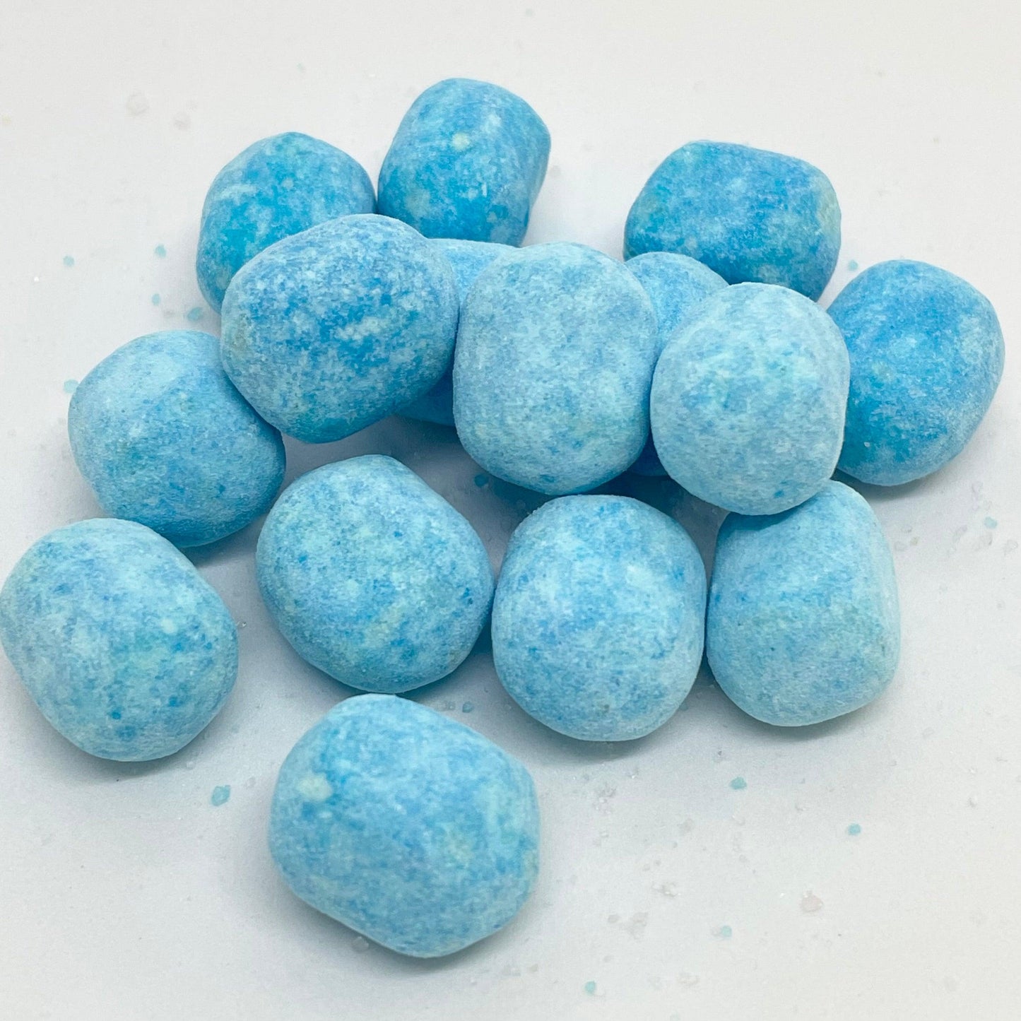Indulge in the sweetness of Blue Raspberry Bon Bons! These chewy sweets are sugar-dusted and bursting with a delicious blue raspberry flavour. 