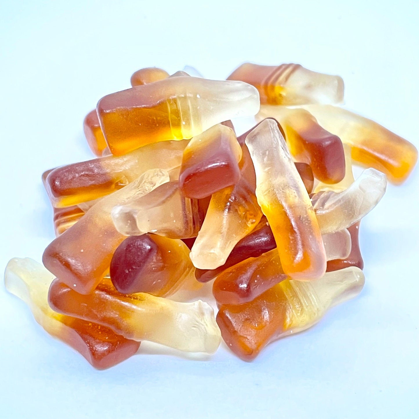 Indulge in a classic cola experience with Cola Bottles. These deliciously flavoured jelly sweets offer a burst of nostalgia and satisfaction with every bite. These treats are sure to please any cola lover. Shop now at that sweet place