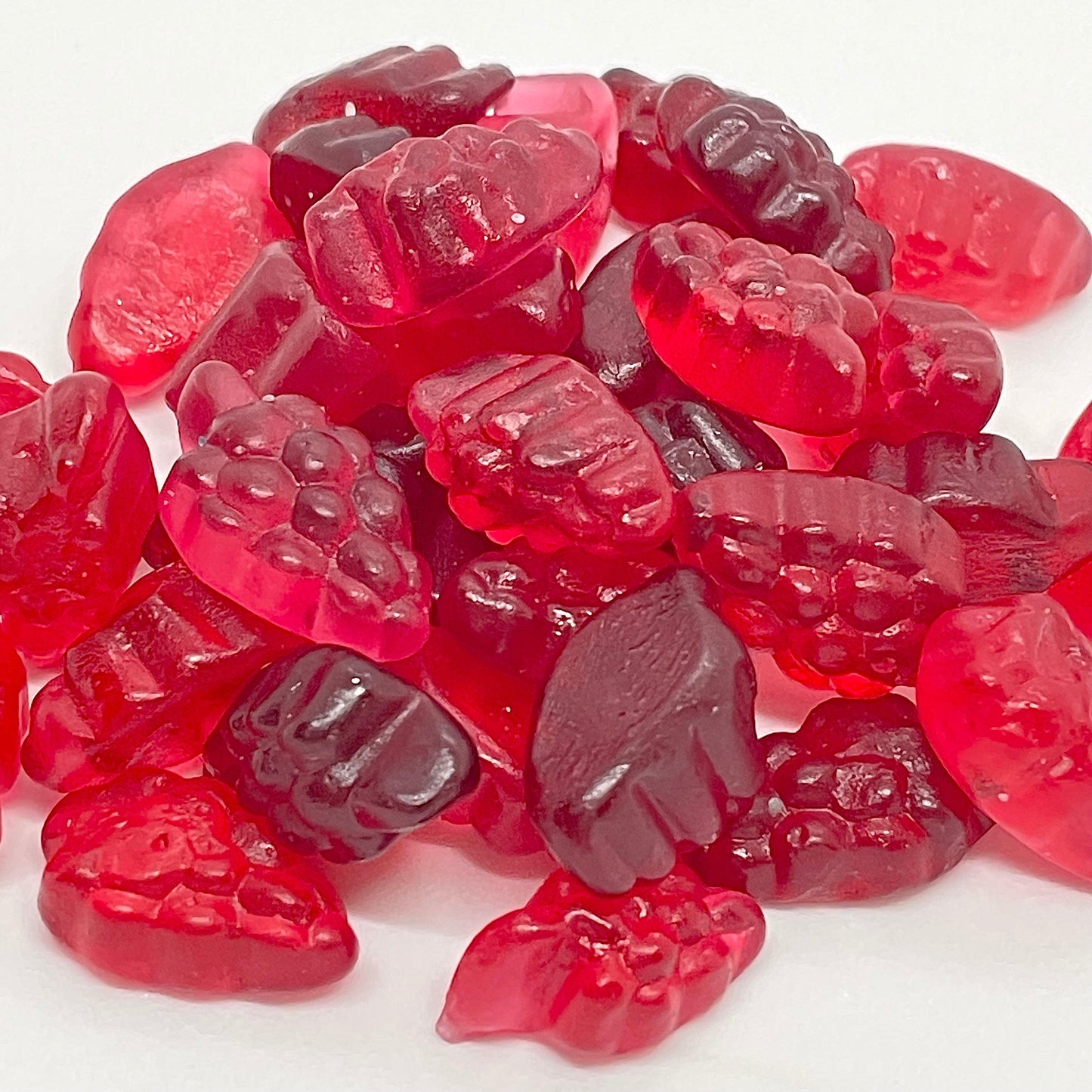 Juicy Berries, loved by all ages! Satisfy your sweet tooth with these delicious mini berry shaped sweets. Experience the perfect blend of strawberry and blackcurrant flavours in each juicy bite. A must-have for any sweet lover.