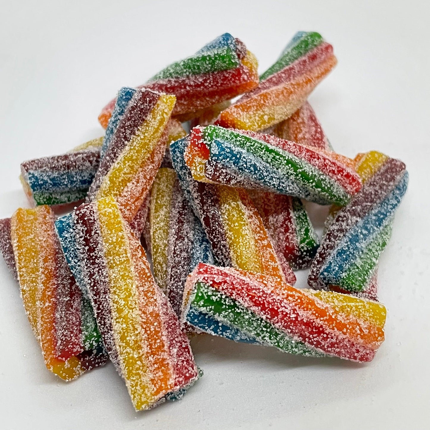Sour Candy Shocks are super sour, fizzy, rainbow coloured sweets.