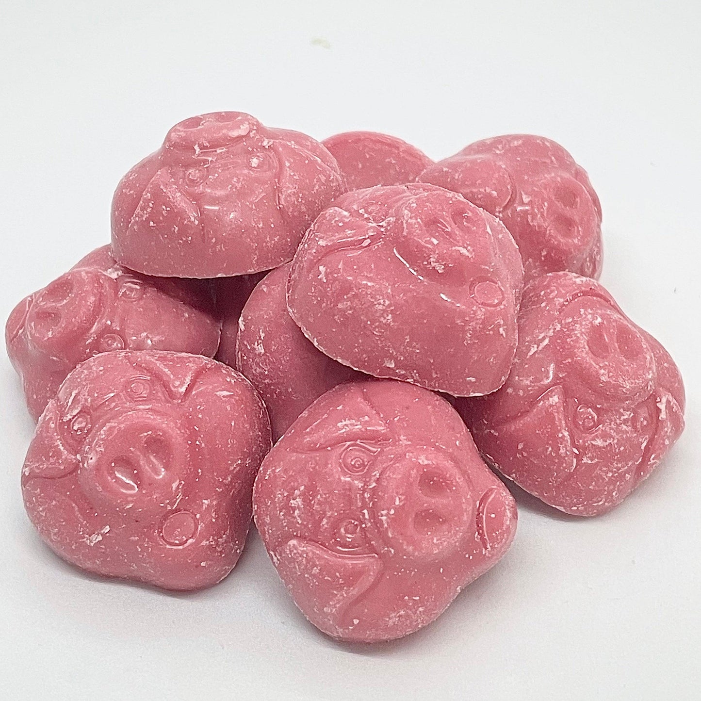 A delicious strawberry flavoured chocolate that is shaped like adorable little piggies. 