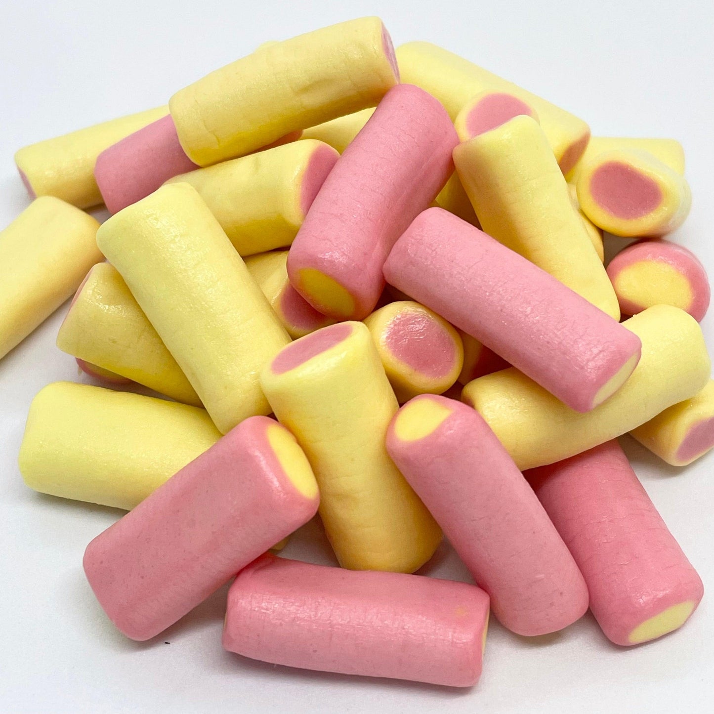 Indulge in the sweet and tangy flavours of Rhubarb and Custard tubes. Unlike traditional hard boiled sweets, these offer a softer texture. Perfect for satisfying your cravings anytime, anywhere. Availble at That Sweet Place
