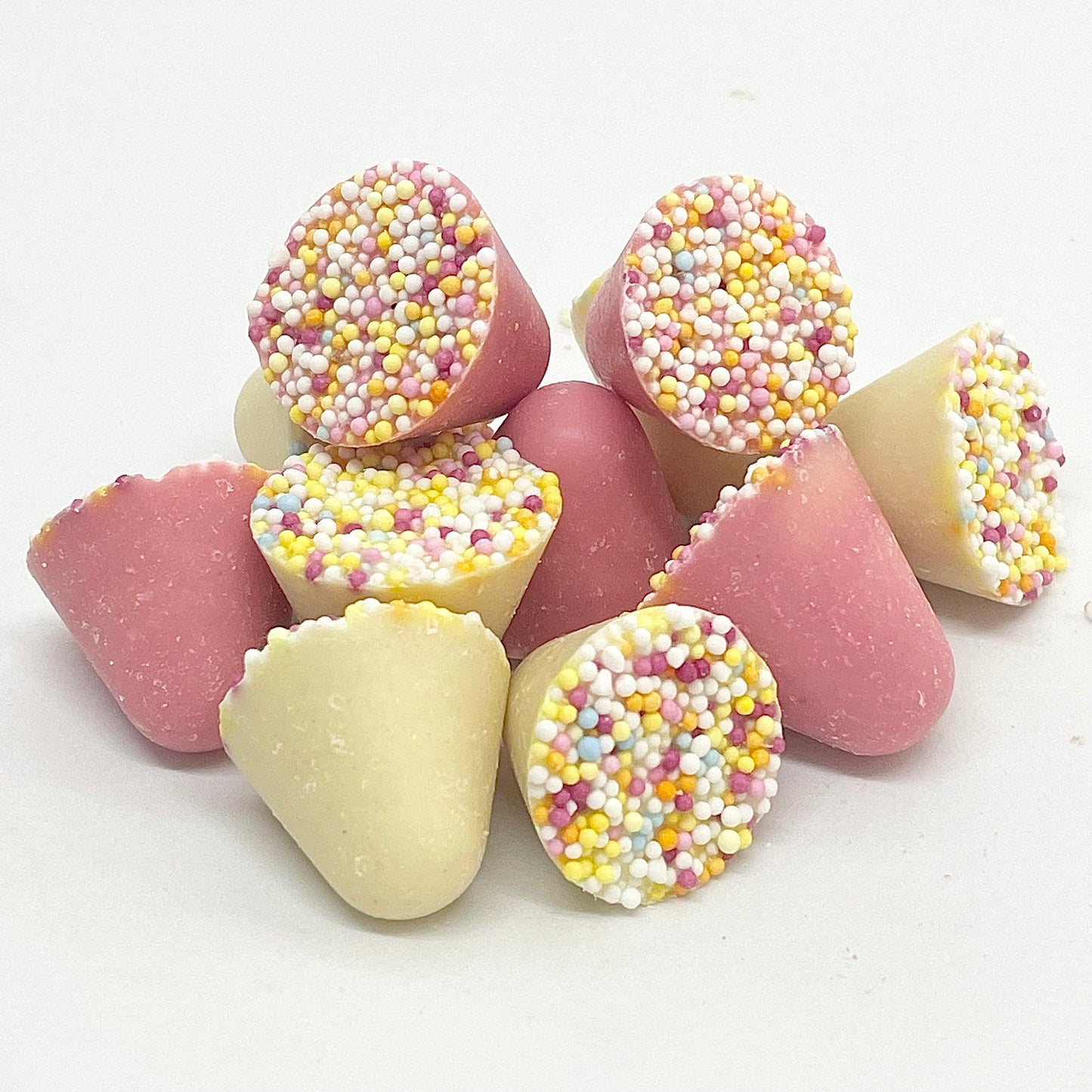 Spinning Tops are an irresistible treat, combining the rich flavour of strawberry and crème chocolate with the fun crunch of hundreds and thousands. The perfect blend of sweetness and texture, these delicious treats are sure to satisfy any craving.