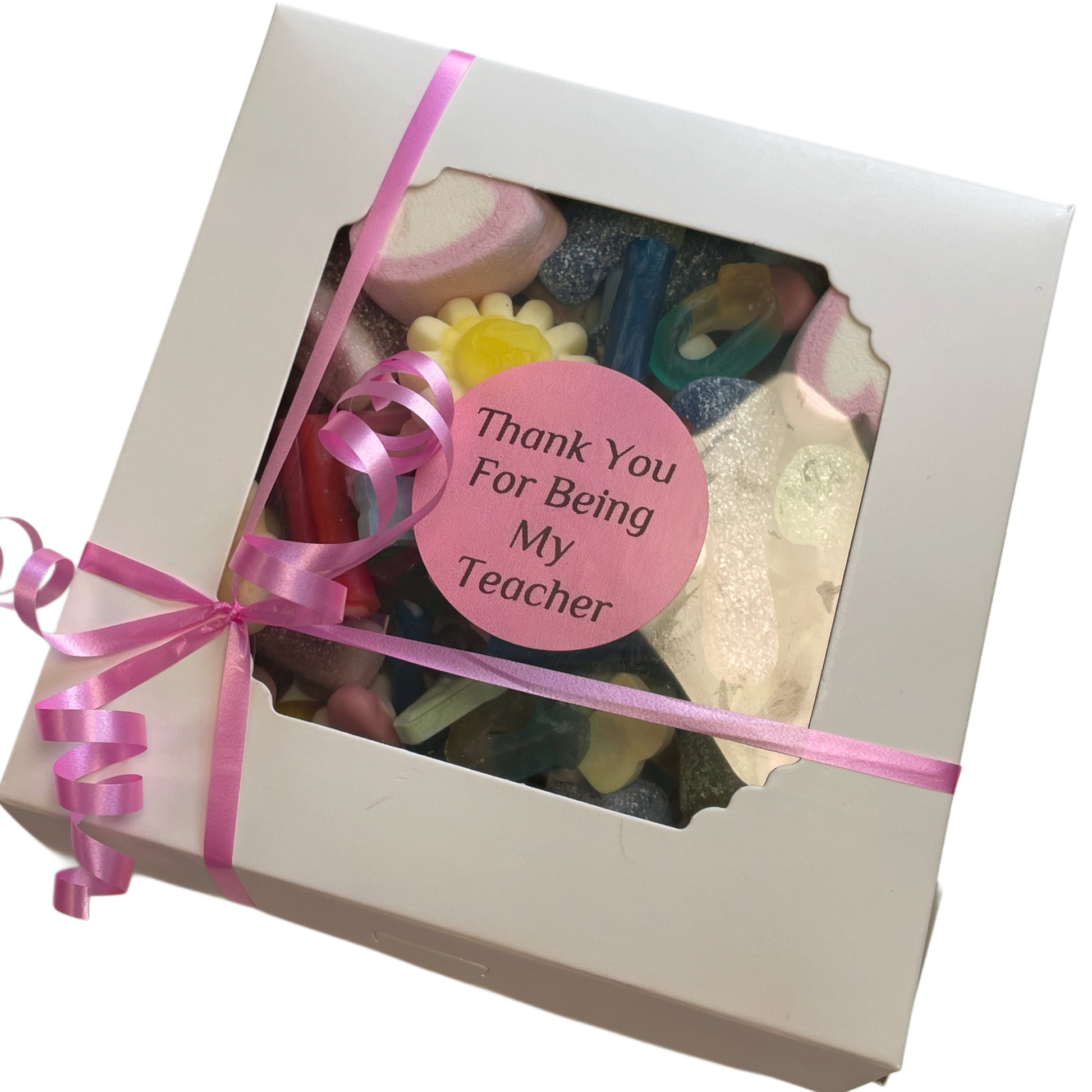 teachers gift box filled with sweet treats that are sure to put a smile on their face
